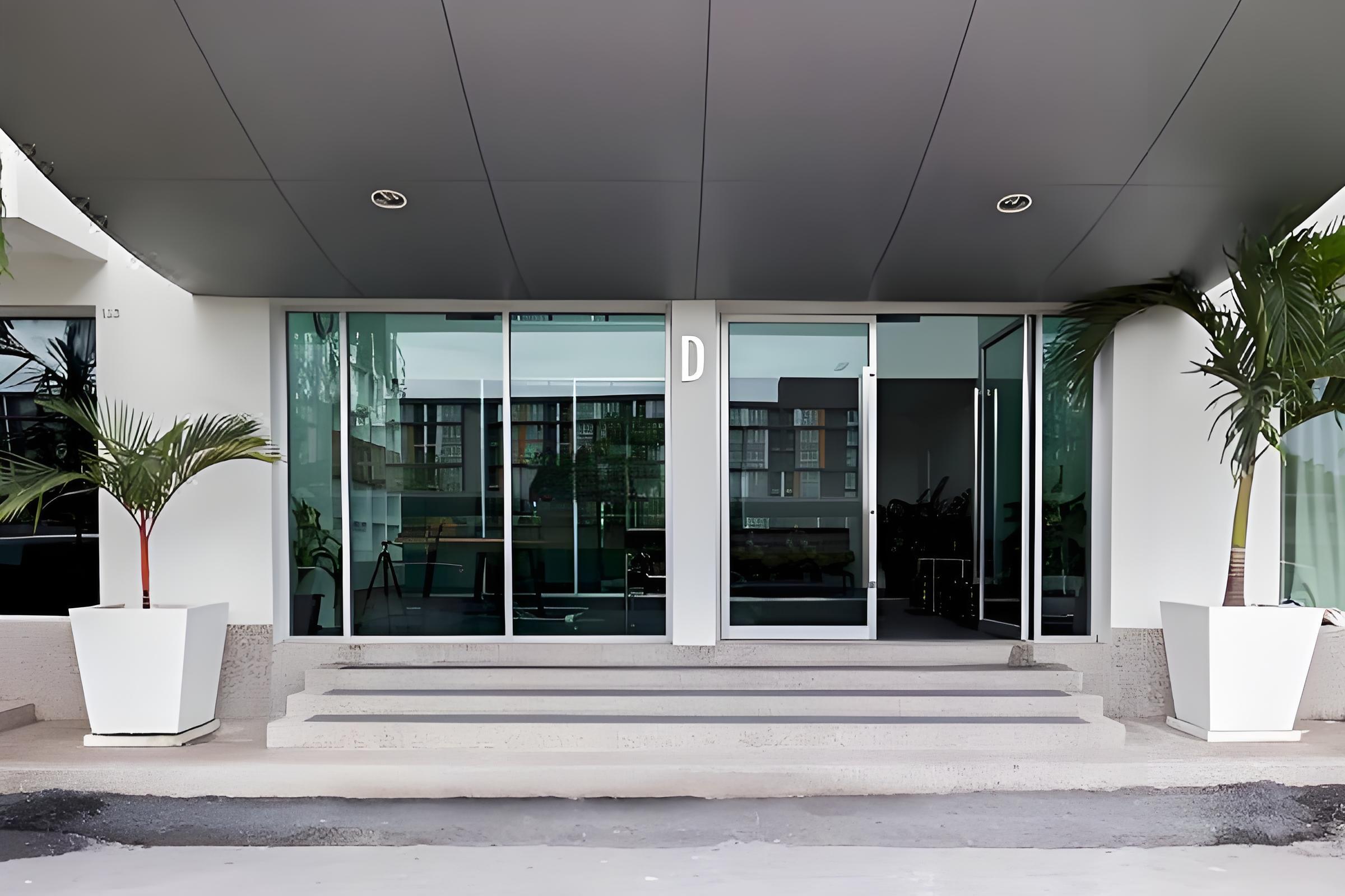 White aluminum commercial alloy spring door