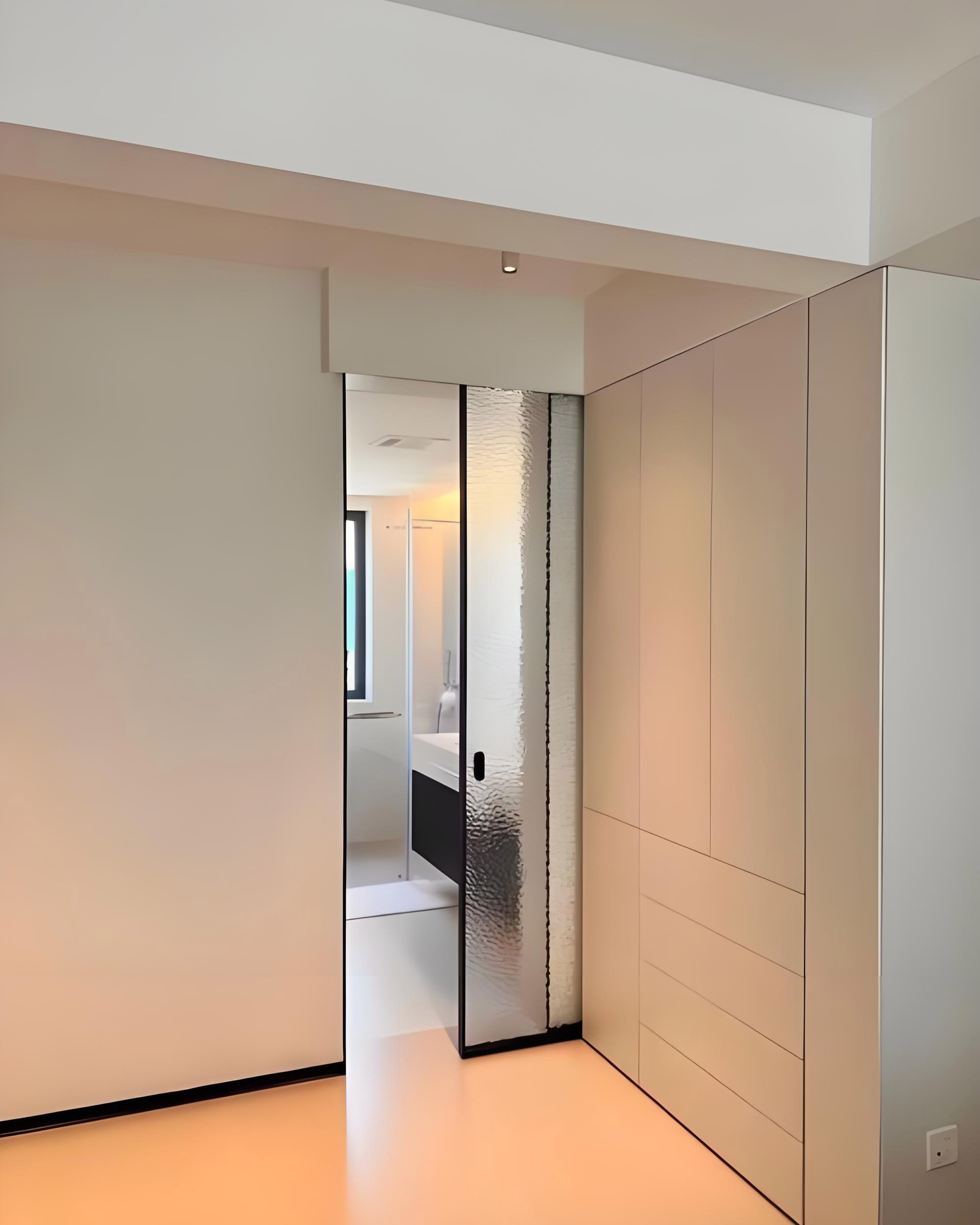 Black narrow frame invisible sliding glass pocket door